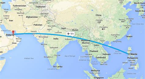 How far is Dubai from Manila .